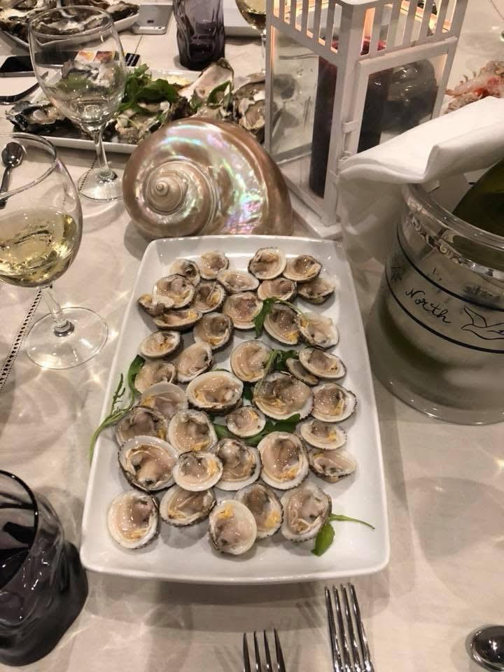 Fresh seafood platter on a white plate